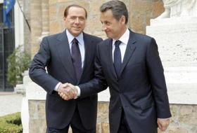 Premierul italian Silvio Berlusconi şi președintele francez Nicolas Sarkozy la summitului de la Roma.