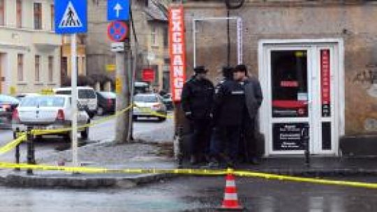 Focuri de armă la o bancă din Braşov