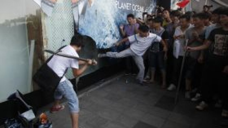 Companii japoneze din China îşi suspendă activitatea