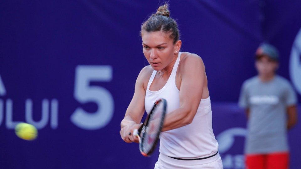 Halep, în sferturi la București