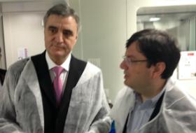 Academician Ionel Sinescu (st&acirc;nga) și ministrul Nicolae Bănicioiu (dreapta).