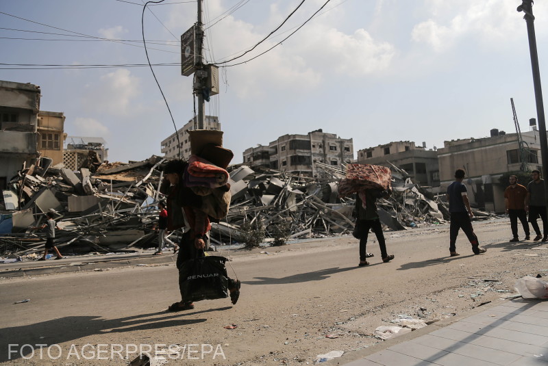Residents of Gaza City have a few belongings gathered as they begin to evacuate following an Israeli warning of increased military operations in the Gaza strip, 14 October 2023. The Israeli Defense Force (IDF) on 13 October had called for the evacuation of all civilians of northern Gaza ahead of an expected ground invasion.